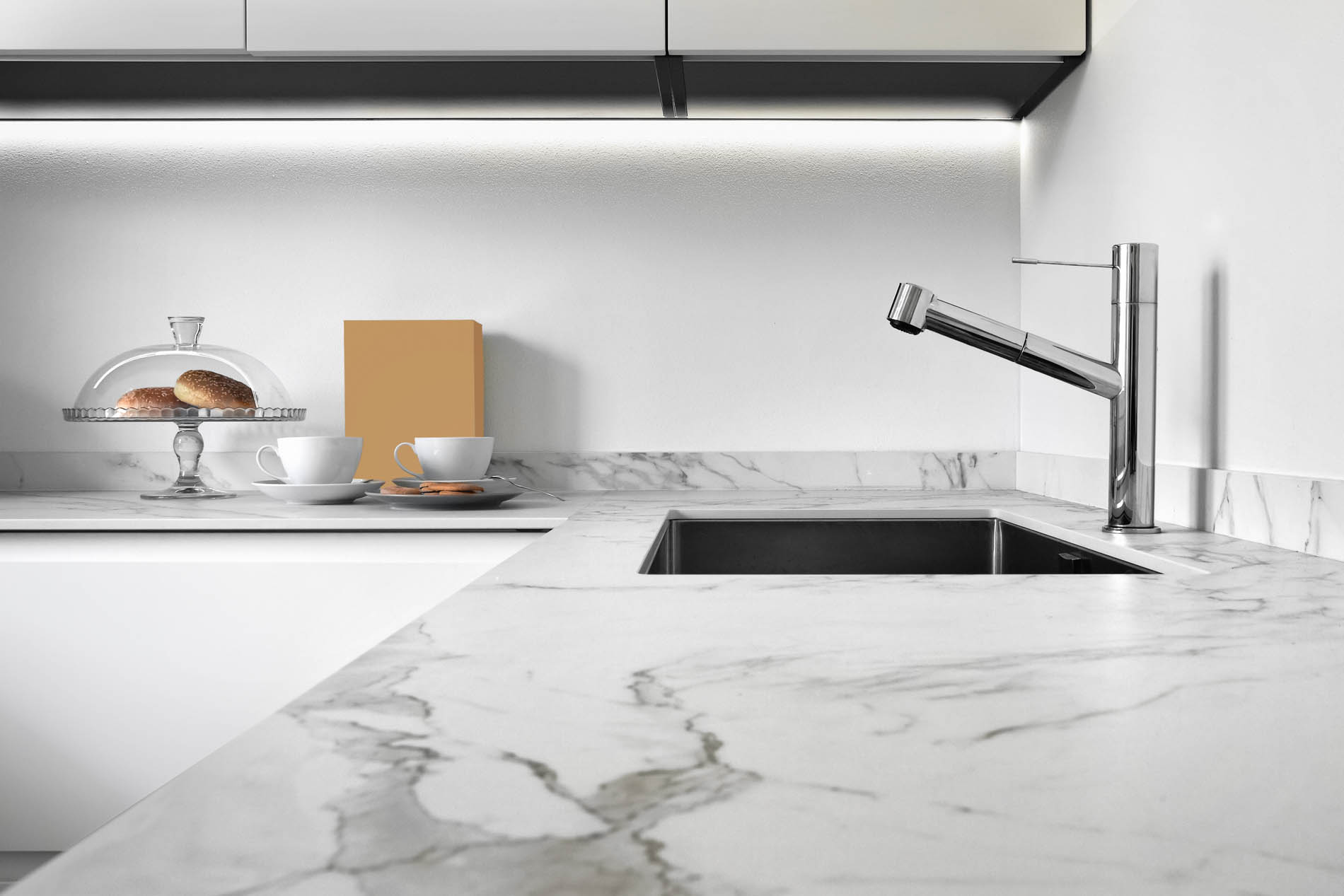 close up of a worktop of a modern kitchen in the foreground the - Kitchen Remodeling Chicago