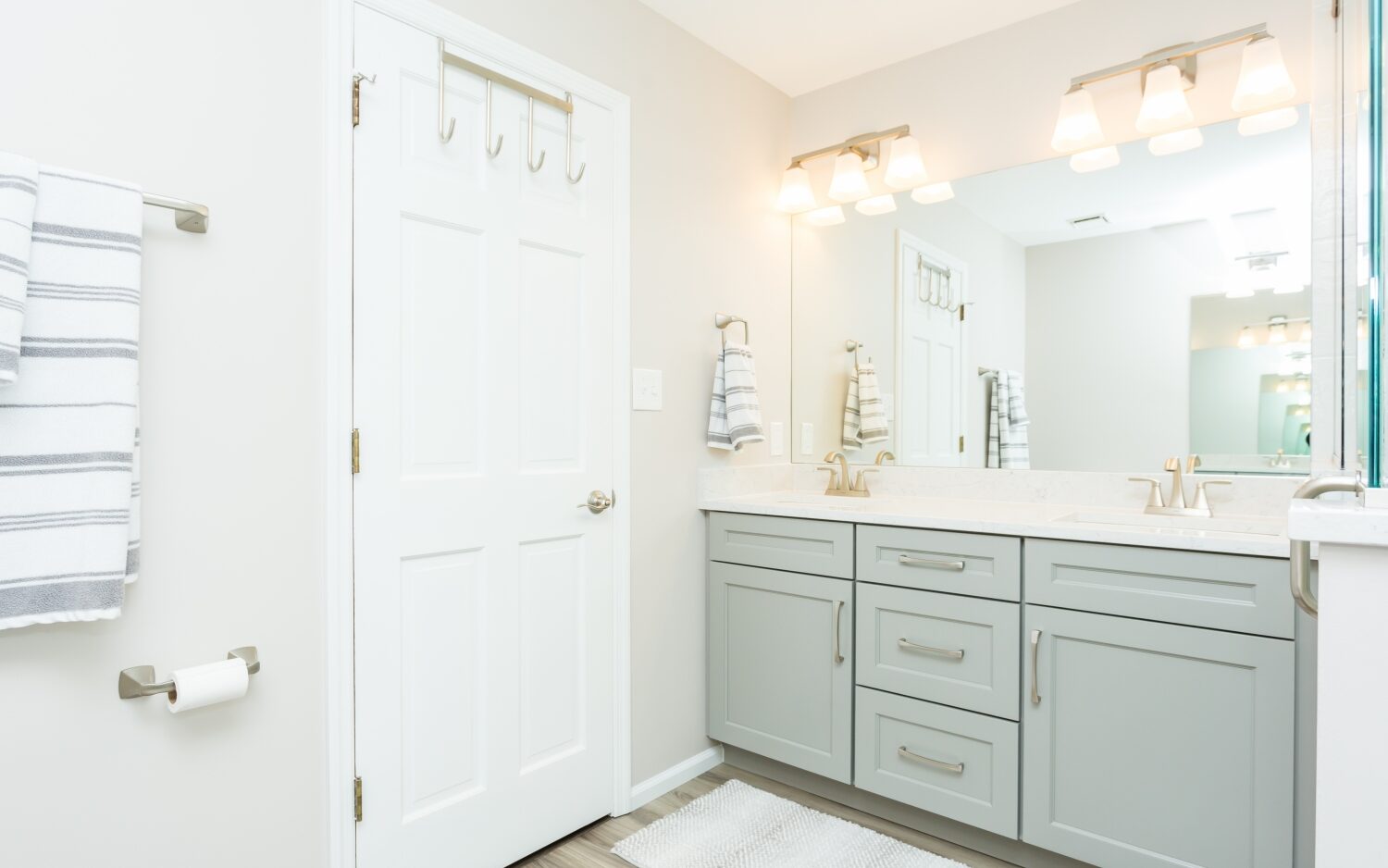 green bathroom with green bathroom vanity