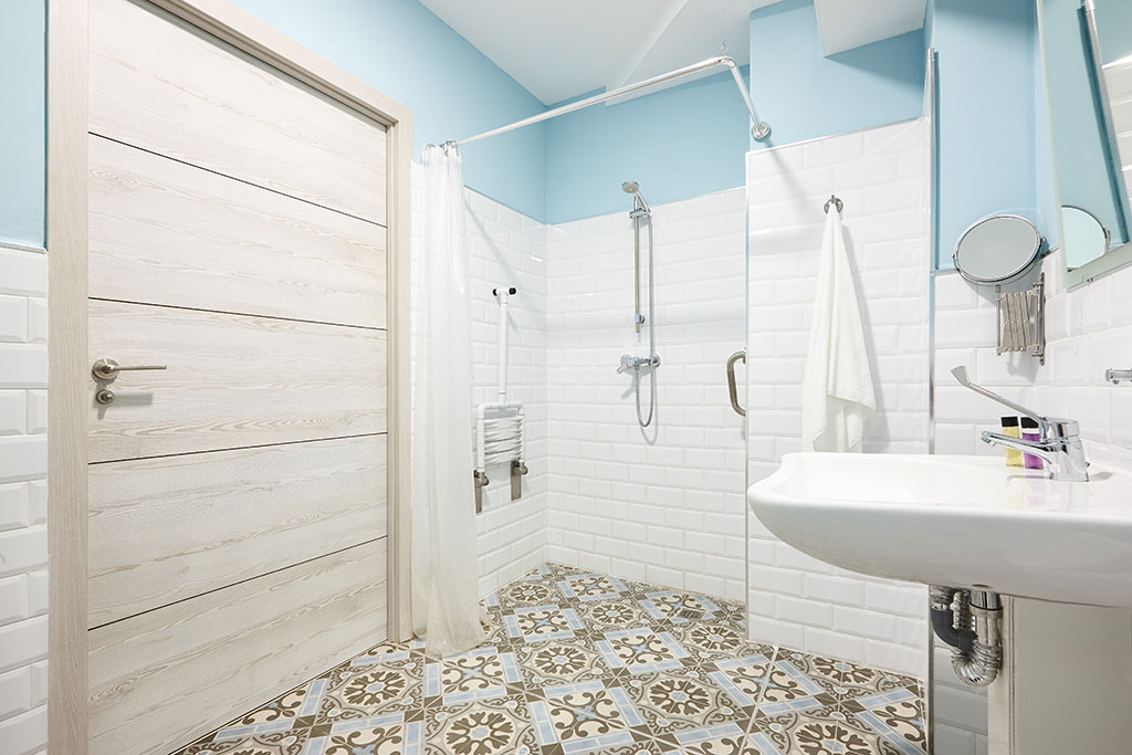 Decorated bathroom adapted for disabled people. Contemporany accessibility indoor architecture