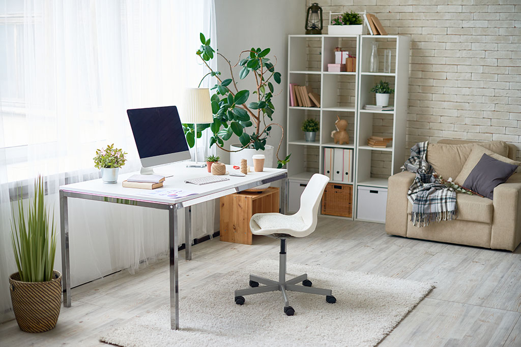 Background image of empty home office space in cozy apartment with modern Scandinavian design